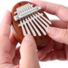 EASTROCK Mini 8-Key Kalimba Thumb Piano – Portable Handheld Mbira with Ornament Clip for Beginners, Travel & Music Lovers
