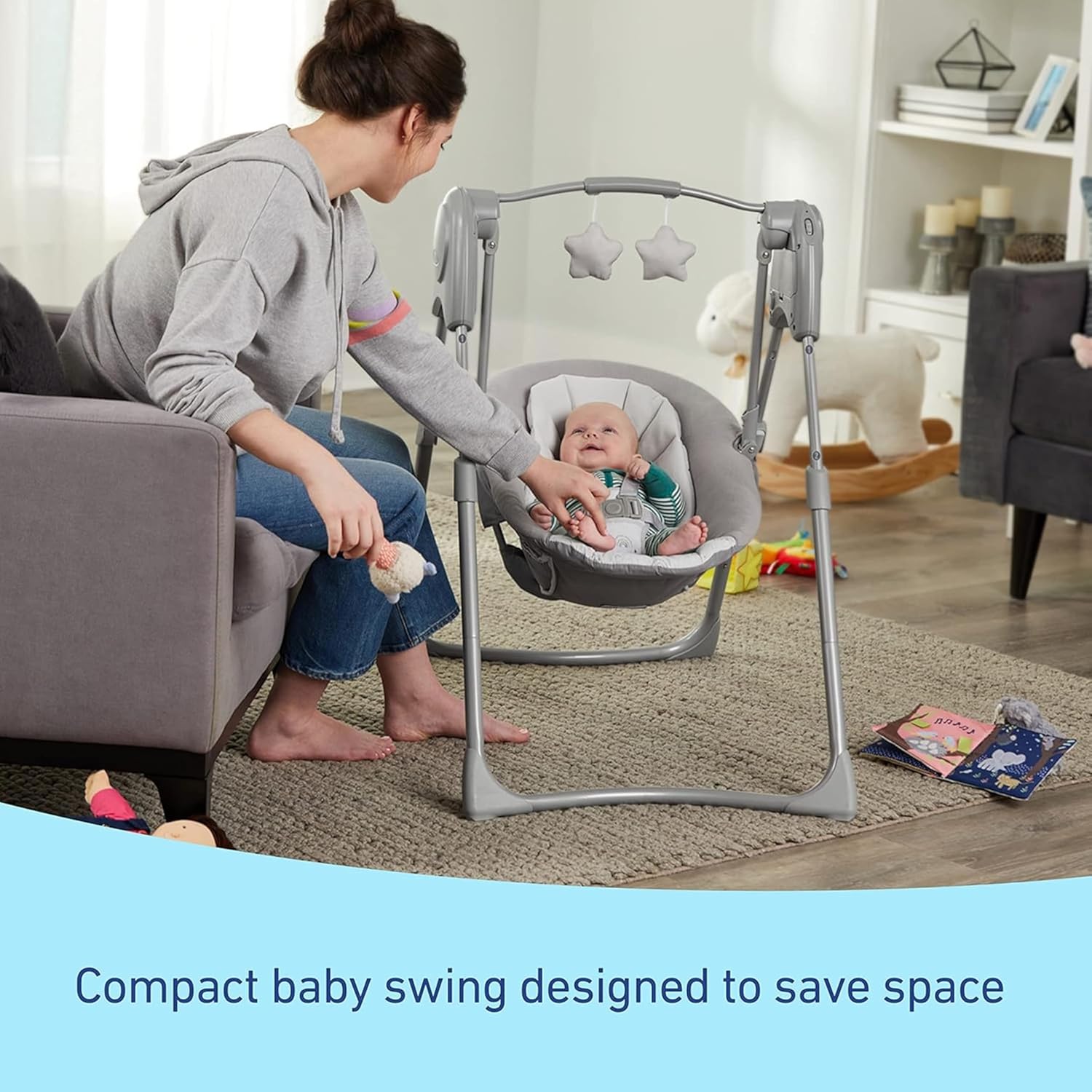 Graco Slim Spaces Compact Baby Swing – Portable, Space-Saving Infant Swing with Adjustable Legs & Plush Toys (Reign)